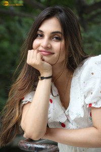 actress Ramya Pasupuleti beautiful in a white floral dress