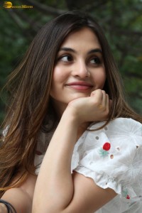 actress Ramya Pasupuleti beautiful in a white floral dress