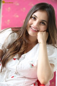 actress Ramya Pasupuleti beautiful in a white floral dress