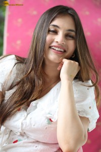 actress Ramya Pasupuleti beautiful in a white floral dress