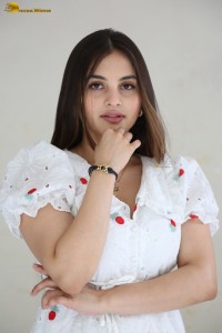 actress Ramya Pasupuleti beautiful in a white floral dress