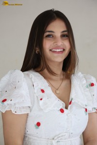 actress Ramya Pasupuleti beautiful in a white floral dress