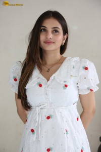 actress Ramya Pasupuleti beautiful in a white floral dress