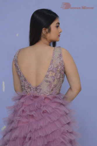 Telugu Actress Ramya Pasupuleti in a pink dress