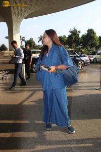 actress Rani Mukerji in denim overalls at mumbai airport