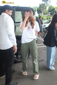 actress Rasha Thadani spotted at mumbai airport in a white t-shirt