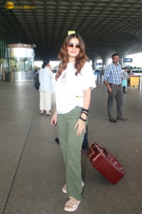 actress Rasha Thadani spotted at mumbai airport in a white t-shirt
