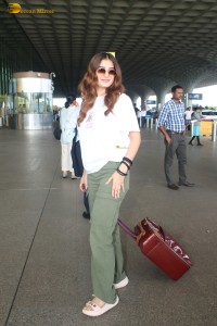 actress Rasha Thadani spotted at mumbai airport in a white t-shirt