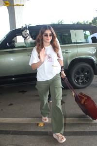 actress Rasha Thadani spotted at mumbai airport in a white t-shirt