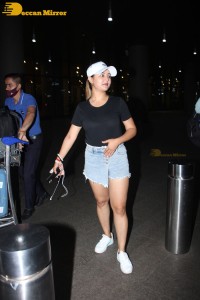 Indian TV Actress Rashami Desai was spotted with her cute furry friend at Mumbai Airport