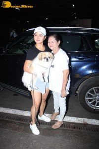 Indian TV Actress Rashami Desai was spotted with her cute furry friend at Mumbai Airport