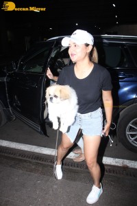 Indian TV Actress Rashami Desai was spotted with her cute furry friend at Mumbai Airport