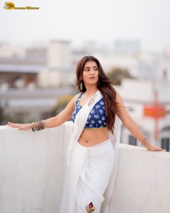 actress Rashi Singh ravishing in a white saree