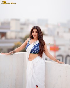 actress Rashi Singh ravishing in a white saree