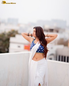 actress Rashi Singh ravishing in a white saree