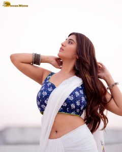 actress Rashi Singh ravishing in a white saree