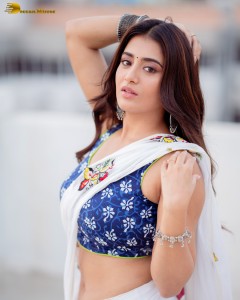actress Rashi Singh ravishing in a white saree