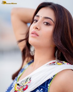 actress Rashi Singh ravishing in a white saree