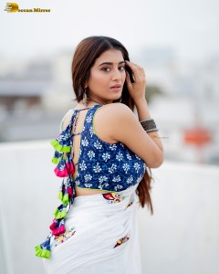 actress Rashi Singh ravishing in a white saree