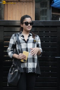 actress rashmika mandanna in a black and white shirt seen visiting a restaurant