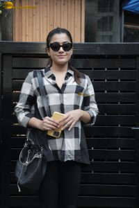 actress rashmika mandanna in a black and white shirt seen visiting a restaurant