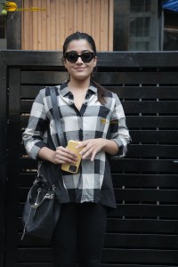 actress rashmika mandanna in a black and white shirt seen visiting a restaurant