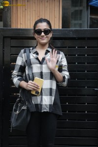 actress rashmika mandanna in a black and white shirt seen visiting a restaurant