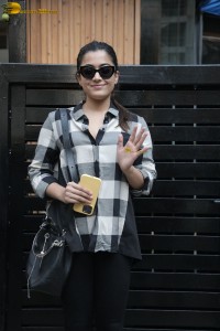 actress rashmika mandanna in a black and white shirt seen visiting a restaurant