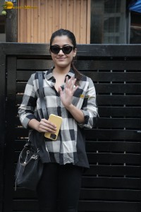 actress rashmika mandanna in a black and white shirt seen visiting a restaurant