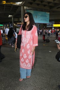 actress Rashmika Mandanna in a pink dress at mumbai airport