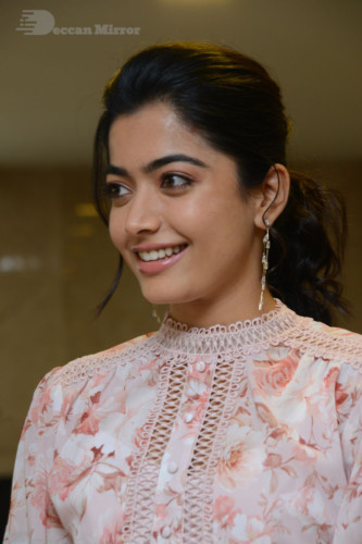 Telugu Actress Rashmika Mandanna photoshoot in a orange and white dress