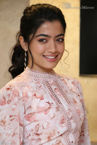Telugu Actress Rashmika Mandanna photoshoot in a orange and white dress