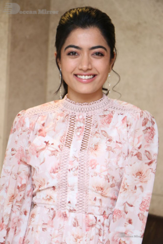 Telugu Actress Rashmika Mandanna photoshoot in a orange and white dress