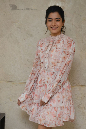 Telugu Actress Rashmika Mandanna photoshoot in a orange and white dress