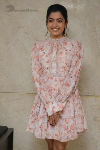 Telugu Actress Rashmika Mandanna photoshoot in a orange and white dress