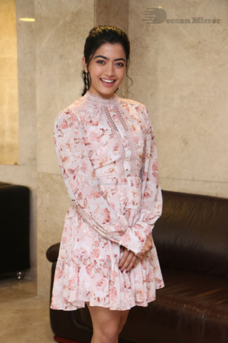 Telugu Actress Rashmika Mandanna photoshoot in a orange and white dress