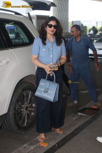 Bollywood actress Raveena Tandon stylish in sunglasses