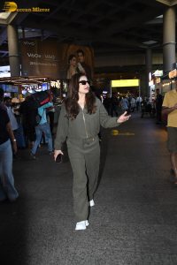 bollywood actress Raveena Tandon cute in a green dress at airport