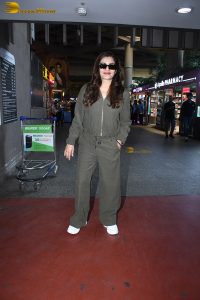 bollywood actress Raveena Tandon cute in a green dress at airport