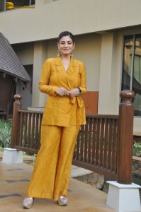 actress Raveena Tandon gorgeous in a yellow dress while promoting her show