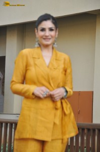 actress Raveena Tandon gorgeous in a yellow dress while promoting her show