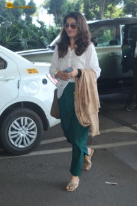 bollywood actress Raveena Tandon was spotted in a stylish outfit at mumbai airport
