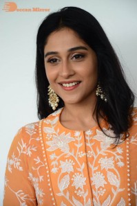 Actress Regina Cassandra Actress poses in a Orange Dress for a Photoshoot