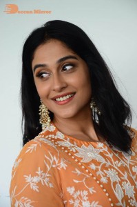 Actress Regina Cassandra Actress poses in a Orange Dress for a Photoshoot
