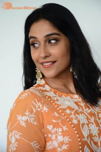 Actress Regina Cassandra Actress poses in a Orange Dress for a Photoshoot