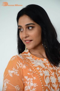 Actress Regina Cassandra Actress poses in a Orange Dress for a Photoshoot