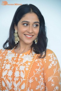 Actress Regina Cassandra Actress poses in a Orange Dress for a Photoshoot