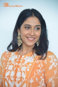 Actress Regina Cassandra Actress poses in a Orange Dress for a Photoshoot