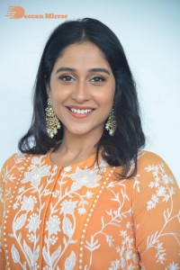 Actress Regina Cassandra Actress poses in a Orange Dress for a Photoshoot