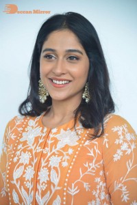 Actress Regina Cassandra Actress poses in a Orange Dress for a Photoshoot